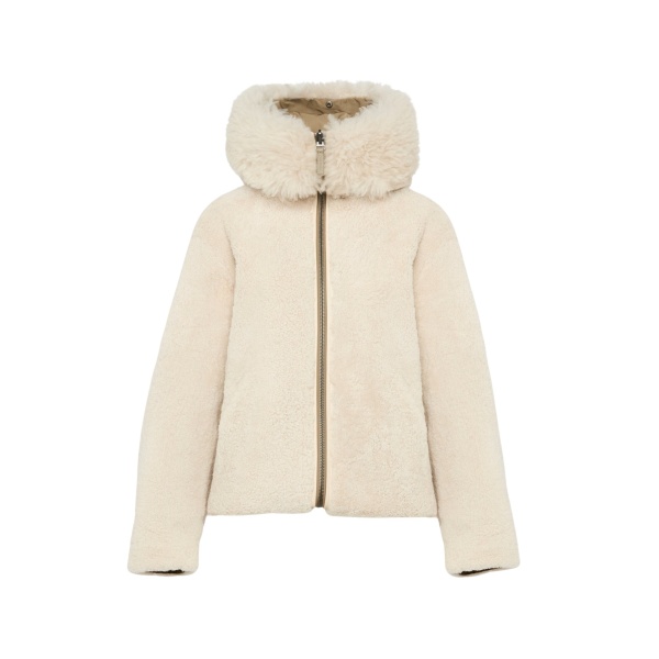 Woman wearing Yves Salomon shearling fur coat – luxury outerwear at Luxury Shoes 