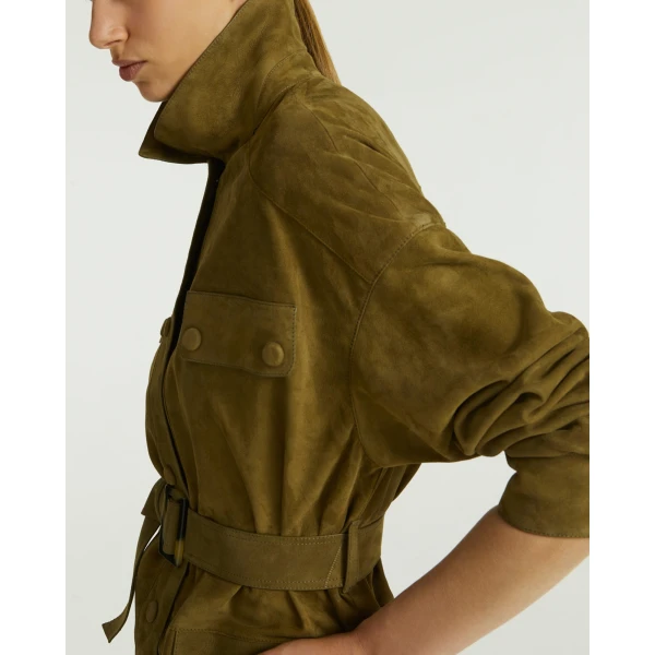 Woman wearing Yves Salomon shearling fur coat – luxury outerwear at Luxury Shoes 