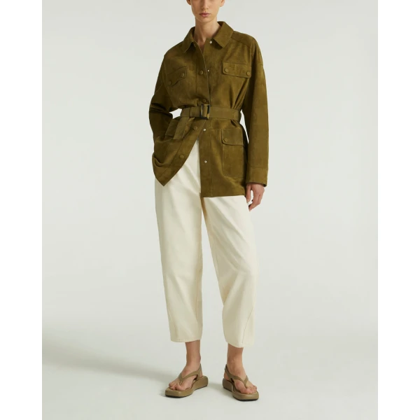 Woman wearing Yves Salomon shearling fur coat – luxury outerwear at Luxury Shoes 
