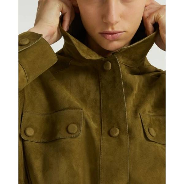 Woman wearing Yves Salomon shearling fur coat – luxury outerwear at Luxury Shoes 