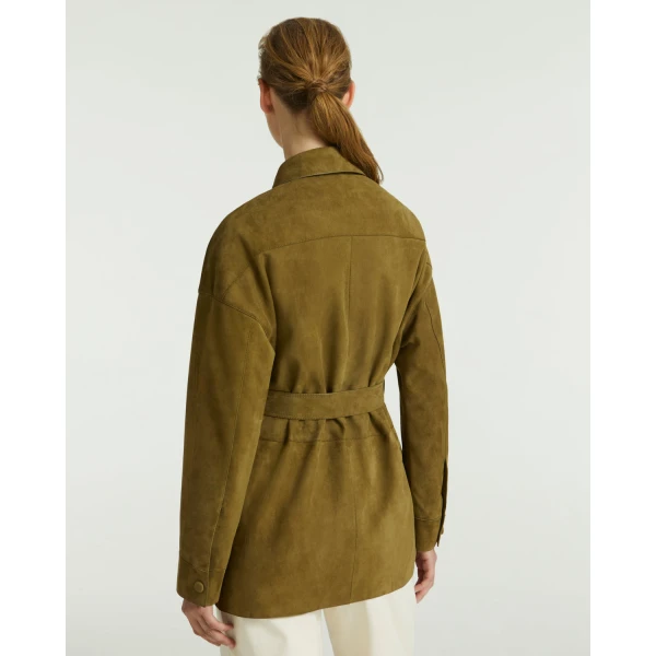 Woman wearing Yves Salomon shearling fur coat – luxury outerwear at Luxury Shoes 