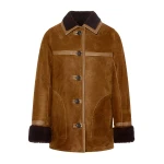 Woman wearing Yves Salomon shearling fur coat – luxury outerwear at Luxury Shoes 