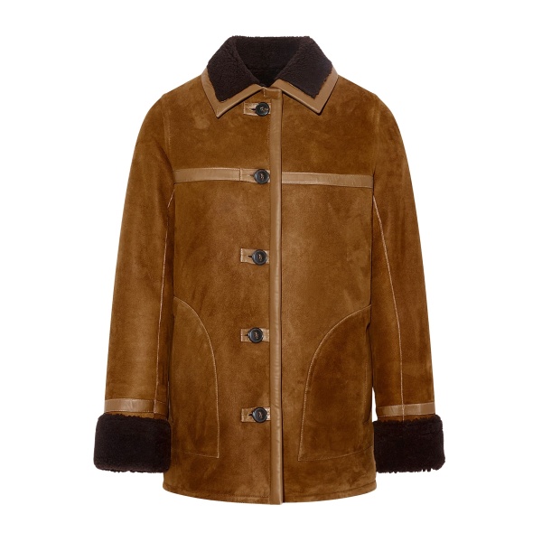 Woman wearing Yves Salomon shearling fur coat – luxury outerwear at Luxury Shoes 