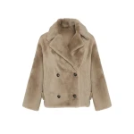 Woman wearing Yves Salomon shearling fur coat – luxury outerwear at Luxury Shoes 