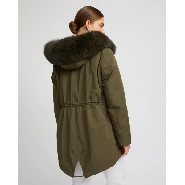 Woman wearing Yves Salomon shearling fur coat – luxury outerwear at Luxury Shoes 