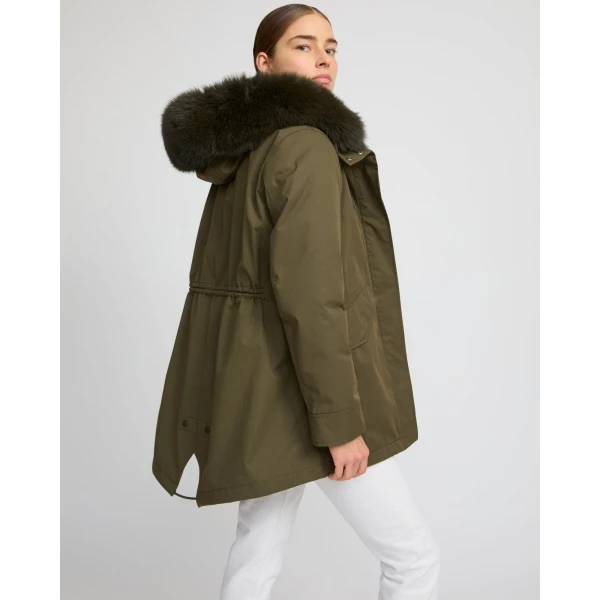 Woman wearing Yves Salomon shearling fur coat – luxury outerwear at Luxury Shoes 