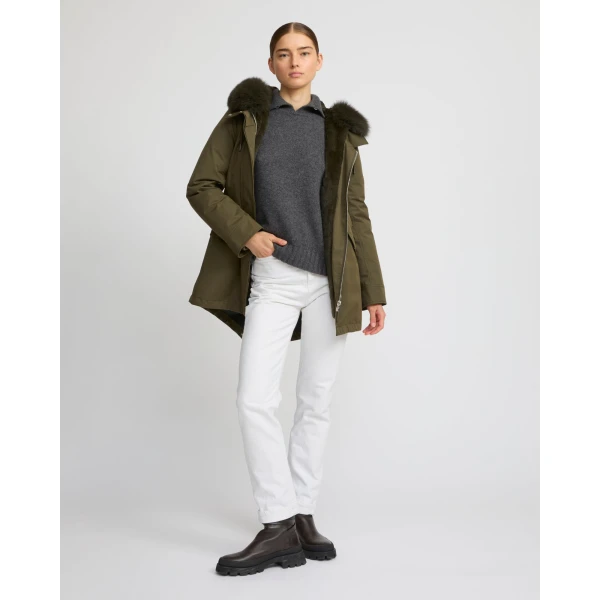Woman wearing Yves Salomon shearling fur coat – luxury outerwear at Luxury Shoes 