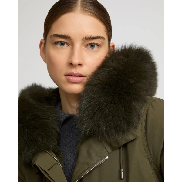 Woman wearing Yves Salomon shearling fur coat – luxury outerwear at Luxury Shoes 