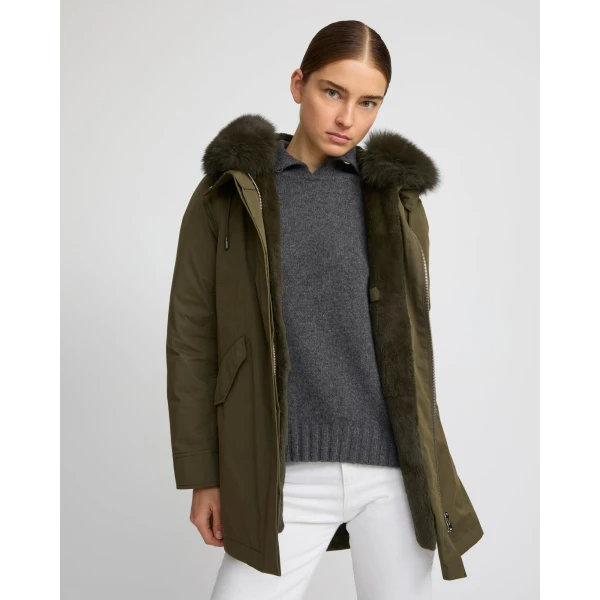 Woman wearing Yves Salomon shearling fur coat – luxury outerwear at Luxury Shoes 