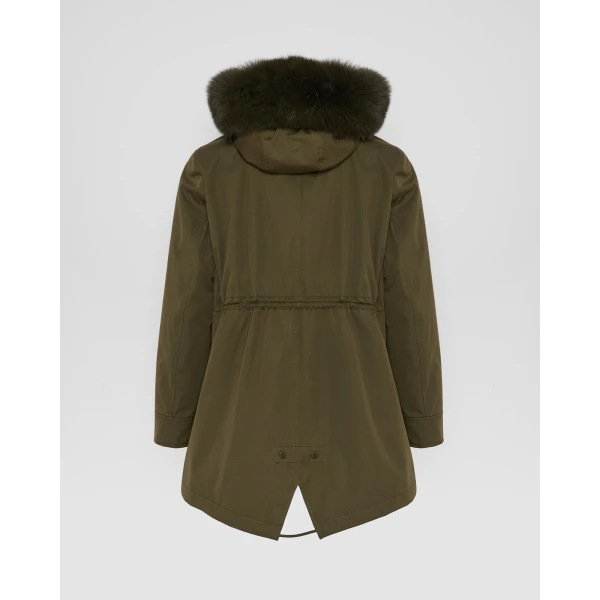 Woman wearing Yves Salomon shearling fur coat – luxury outerwear at Luxury Shoes 