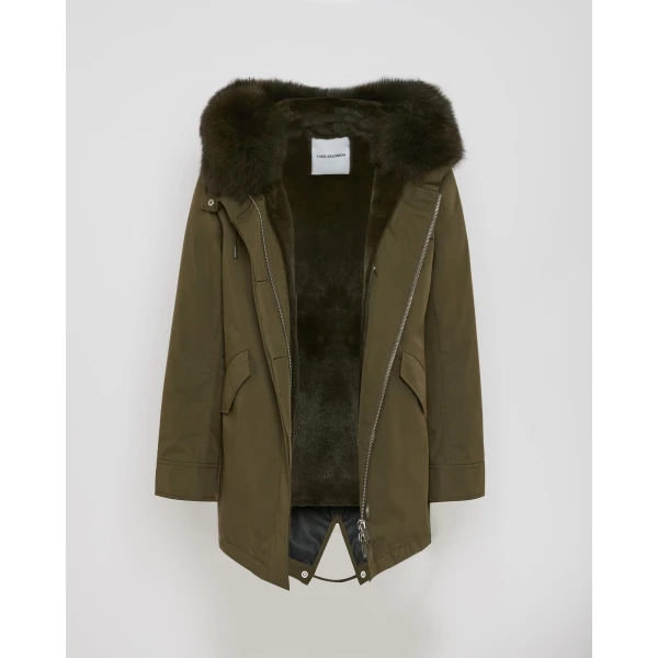 Woman wearing Yves Salomon shearling fur coat – luxury outerwear at Luxury Shoes 