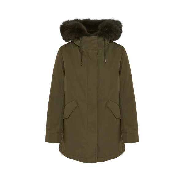 Woman wearing Yves Salomon shearling fur coat – luxury outerwear at Luxury Shoes 