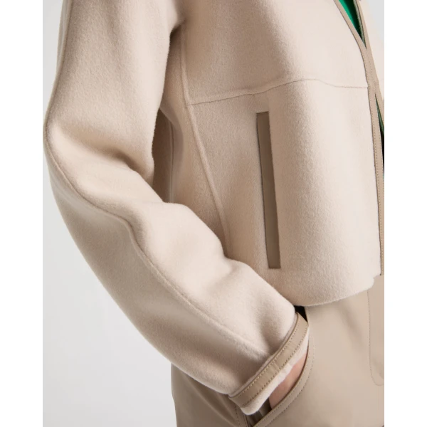 Woman wearing Yves Salomon shearling fur coat – luxury outerwear at Luxury Shoes 