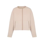 Woman wearing Yves Salomon shearling fur coat – luxury outerwear at Luxury Shoes 