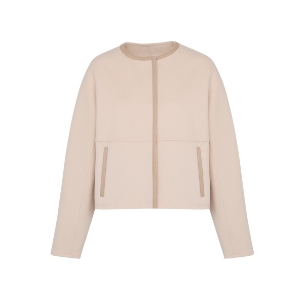 Woman wearing Yves Salomon shearling fur coat – luxury outerwear at Luxury Shoes 