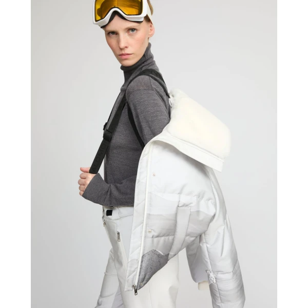 Woman wearing Yves Salomon shearling fur coat – luxury outerwear at Luxury Shoes 