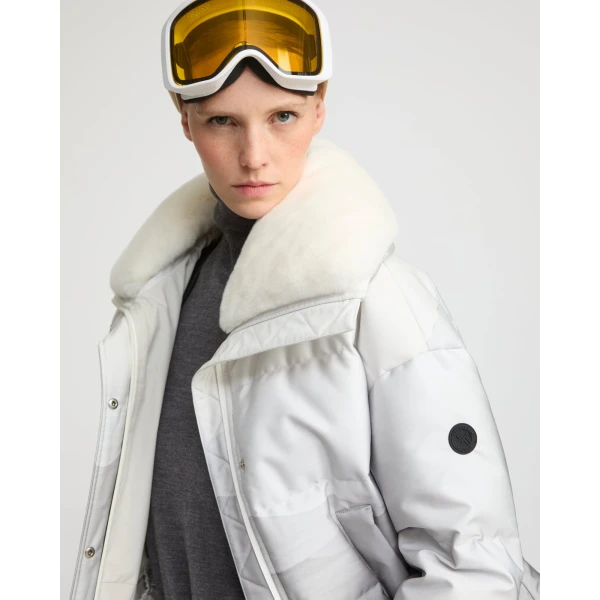 Woman wearing Yves Salomon shearling fur coat – luxury outerwear at Luxury Shoes 