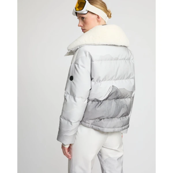 Woman wearing Yves Salomon shearling fur coat – luxury outerwear at Luxury Shoes 