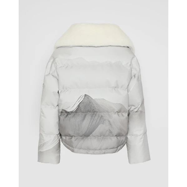 Woman wearing Yves Salomon shearling fur coat – luxury outerwear at Luxury Shoes 