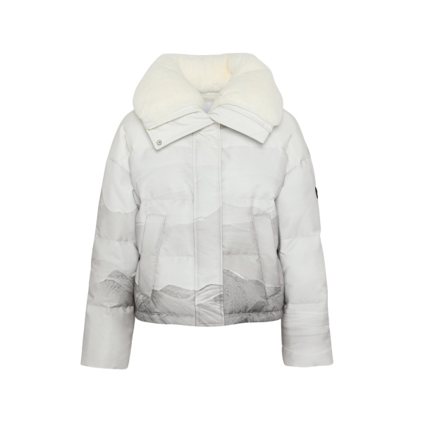 Woman wearing Yves Salomon shearling fur coat – luxury outerwear at Luxury Shoes 