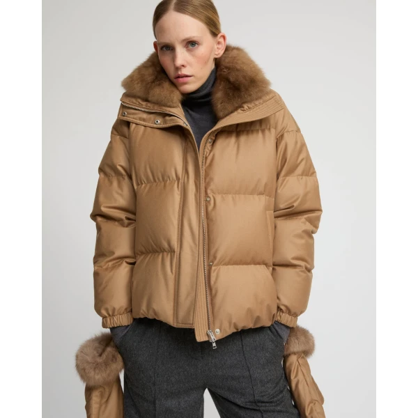 Woman wearing Yves Salomon shearling fur coat – luxury outerwear at Luxury Shoes 
