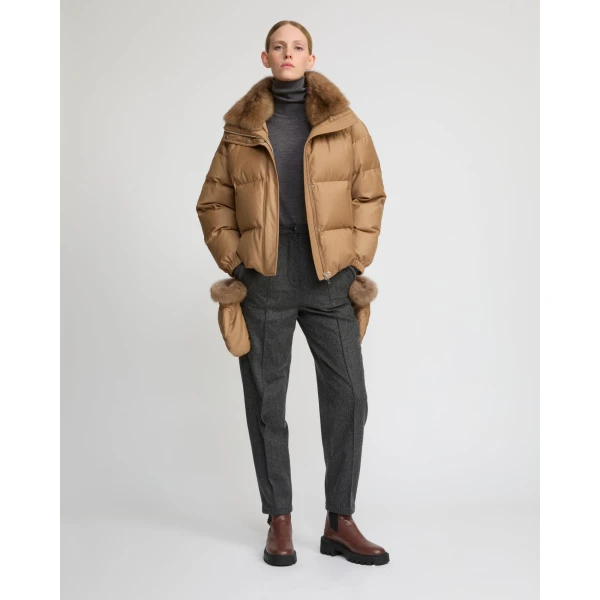 Woman wearing Yves Salomon shearling fur coat – luxury outerwear at Luxury Shoes 