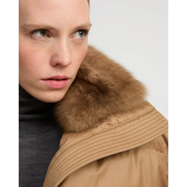 Woman wearing Yves Salomon shearling fur coat – luxury outerwear at Luxury Shoes 
