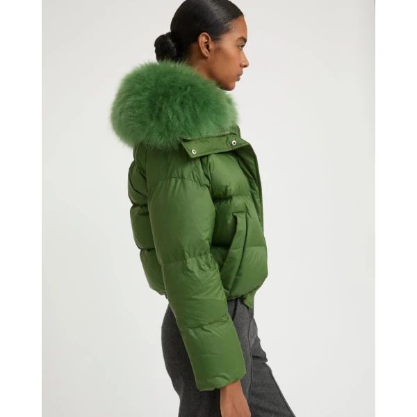 Woman wearing Yves Salomon shearling fur coat – luxury outerwear at Luxury Shoes 