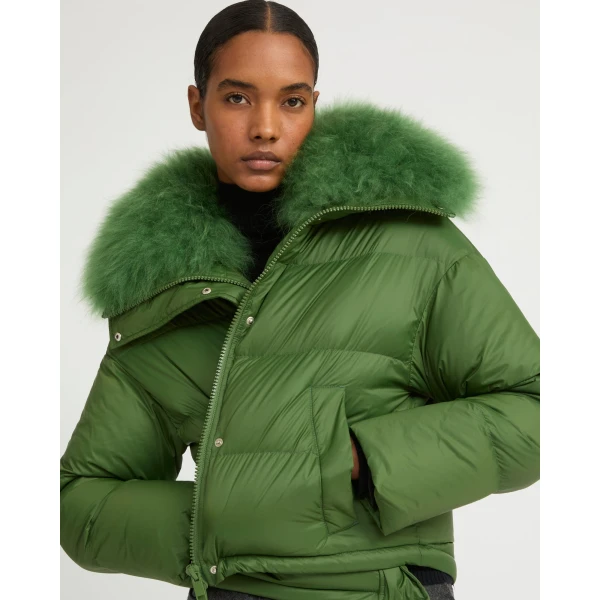 Woman wearing Yves Salomon shearling fur coat – luxury outerwear at Luxury Shoes 
