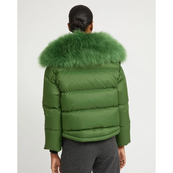 Woman wearing Yves Salomon shearling fur coat – luxury outerwear at Luxury Shoes 