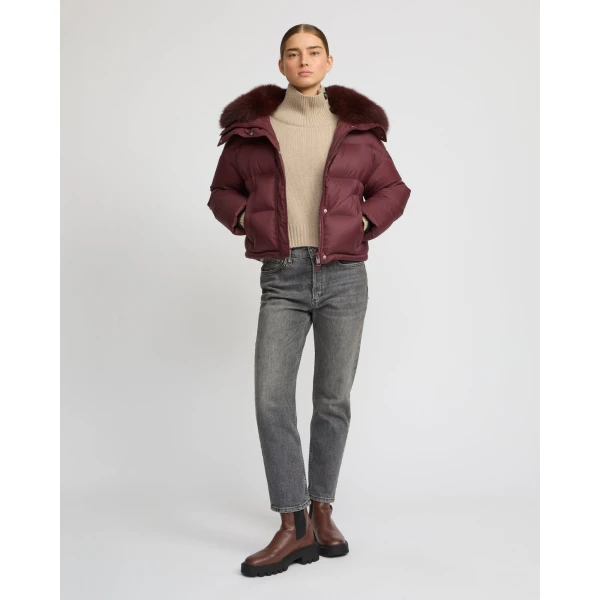 Woman wearing Yves Salomon shearling fur coat – luxury outerwear at Luxury Shoes 