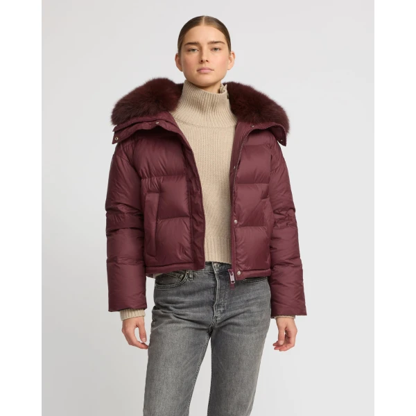 Woman wearing Yves Salomon shearling fur coat – luxury outerwear at Luxury Shoes 