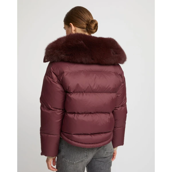 Woman wearing Yves Salomon shearling fur coat – luxury outerwear at Luxury Shoes 