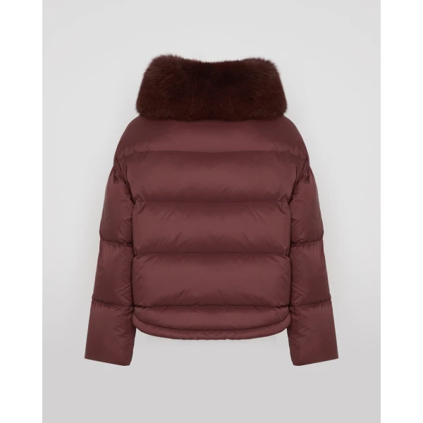 Woman wearing Yves Salomon shearling fur coat – luxury outerwear at Luxury Shoes 