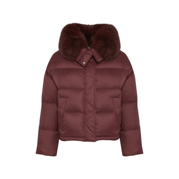 Woman wearing Yves Salomon shearling fur coat – luxury outerwear at Luxury Shoes 