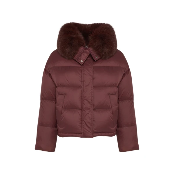 Woman wearing Yves Salomon shearling fur coat – luxury outerwear at Luxury Shoes 
