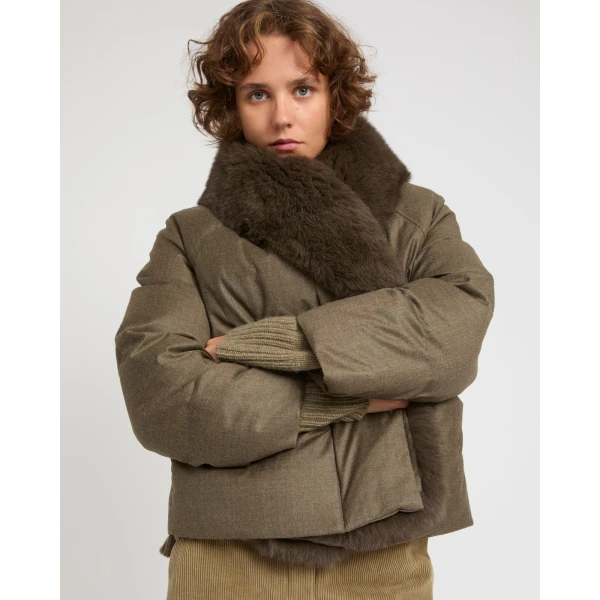 Woman wearing Yves Salomon shearling fur coat – luxury outerwear at Luxury Shoes 