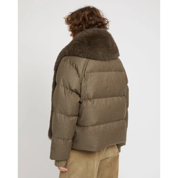 Woman wearing Yves Salomon shearling fur coat – luxury outerwear at Luxury Shoes 