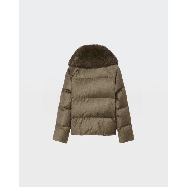 Woman wearing Yves Salomon shearling fur coat – luxury outerwear at Luxury Shoes 