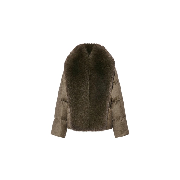Woman wearing Yves Salomon shearling fur coat – luxury outerwear at Luxury Shoes 