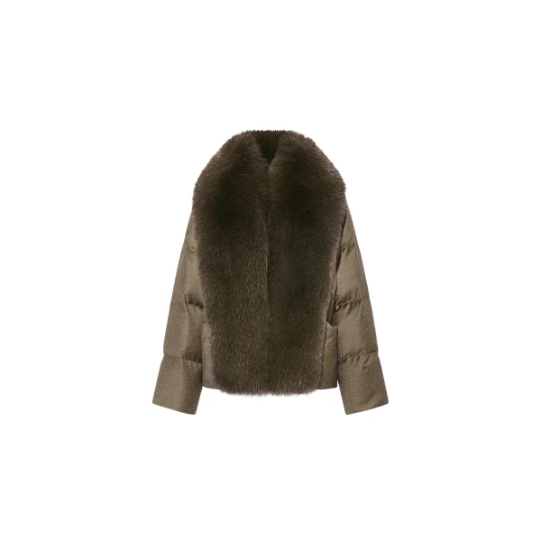 Woman wearing Yves Salomon shearling fur coat – luxury outerwear at Luxury Shoes 
