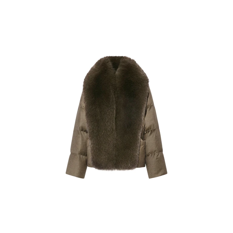 Woman wearing Yves Salomon shearling fur coat – luxury outerwear at Luxury Shoes 