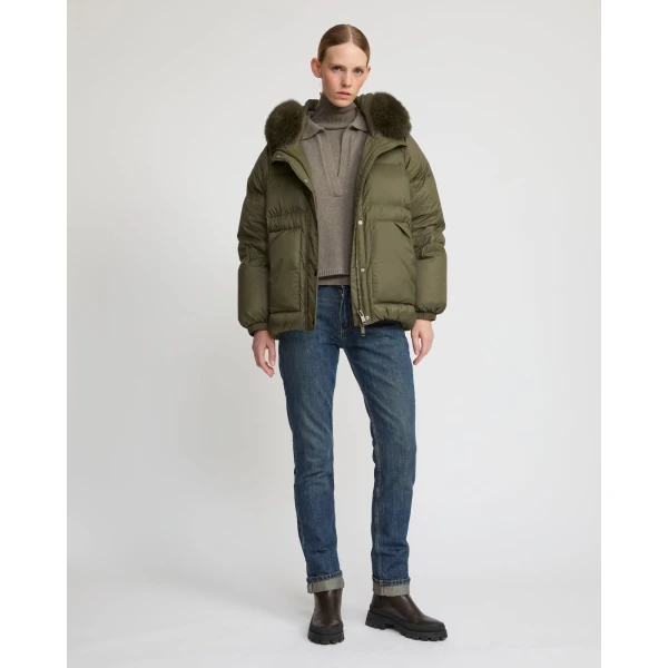 Woman wearing Yves Salomon shearling fur coat – luxury outerwear at Luxury Shoes 