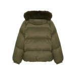 Woman wearing Yves Salomon shearling fur coat – luxury outerwear at Luxury Shoes 