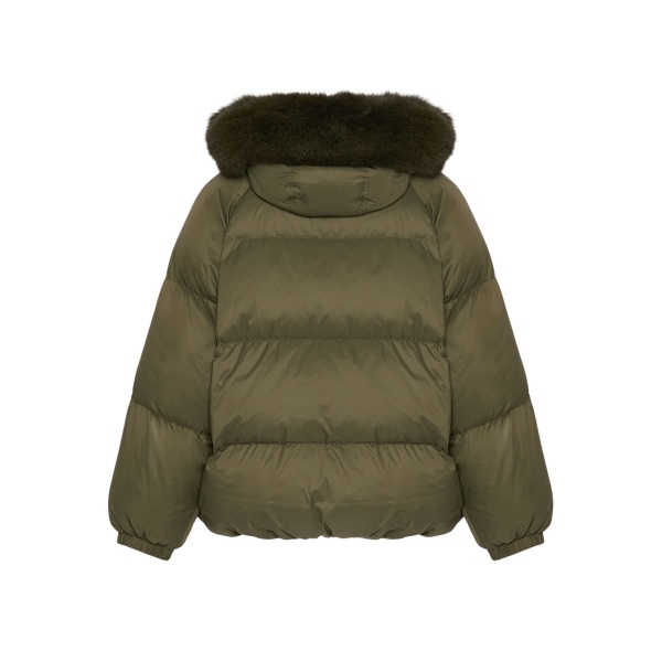 Woman wearing Yves Salomon shearling fur coat – luxury outerwear at Luxury Shoes 