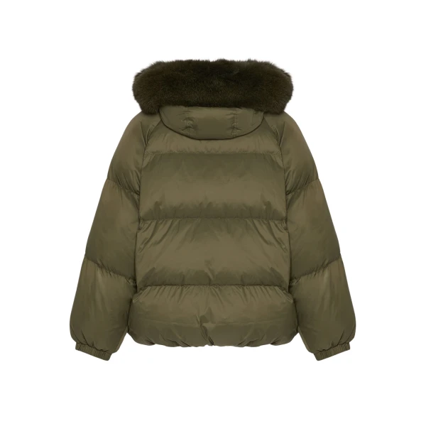 Woman wearing Yves Salomon shearling fur coat – luxury outerwear at Luxury Shoes 