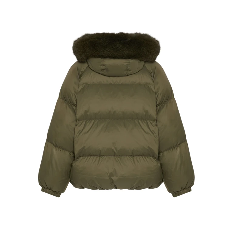 Woman wearing Yves Salomon shearling fur coat – luxury outerwear at Luxury Shoes 
