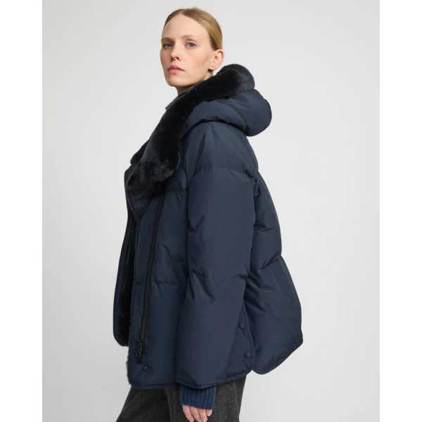 Woman wearing Yves Salomon shearling fur coat – luxury outerwear at Luxury Shoes 