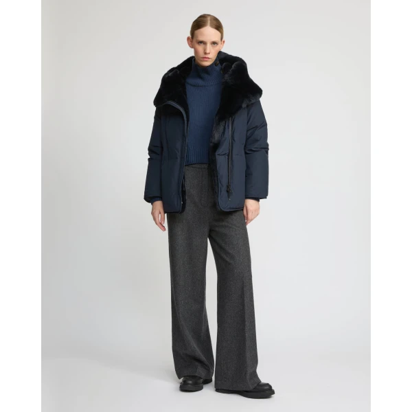 Woman wearing Yves Salomon shearling fur coat – luxury outerwear at Luxury Shoes 