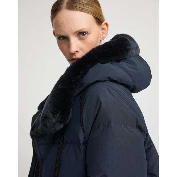 Woman wearing Yves Salomon shearling fur coat – luxury outerwear at Luxury Shoes 